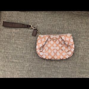 Coach - rose gold wristlet